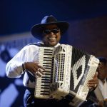 Nathan Williams performs with an accordian.